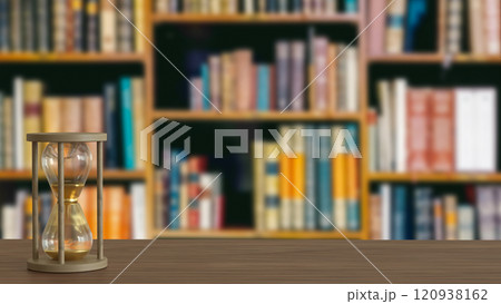 The Sand clock on wood table in library image 3d rendering. The Sand clock on wood table in library image 3d rendering. 120938162