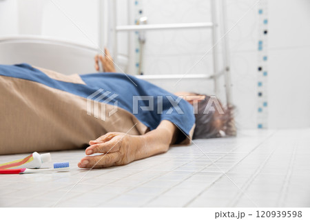 Elderly woman falling in bathroom because slippery surfaces. 120939598