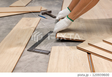 DIY Tips for Installing Interlocking Laminate Flooring 120939600