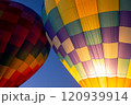 Hot air balloons lift off into the dawn sky 120939914