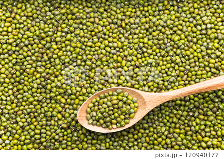 green peas in wooden spoon green peas in wooden spoon 120940177