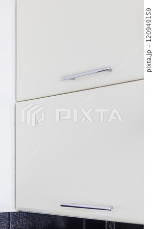 Close up shot of the kitchen cabinets in the kitchen Close up shot of the kitchen cabinets in the kitchen 120949159