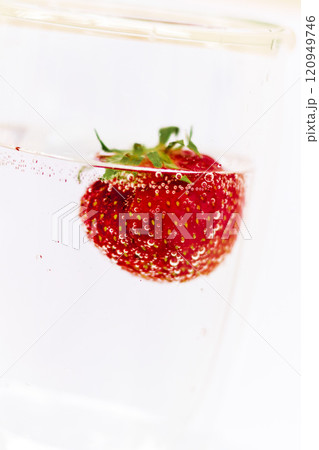 Close up shot of the strawberries in the water. Shot is good for commercials Close up shot of the strawberries in the water. Shot is good for commercials 120949746