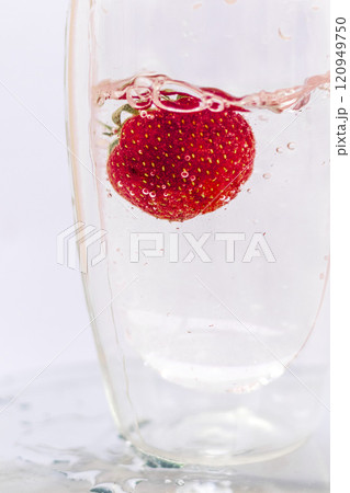 Close up shot of the strawberries in the water. Shot is good for commercials Close up shot of the strawberries in the water. Shot is good for commercials 120949750