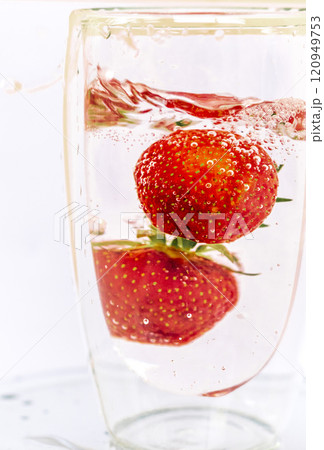 Close up shot of the strawberries in the water. Shot is good for commercials 120949753