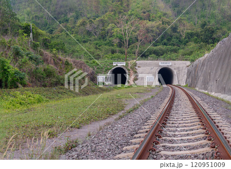 The entrance of Railroad and Railway tunnel through the Mountain surrounded by nature at Khao phra phutthachai. 120951009