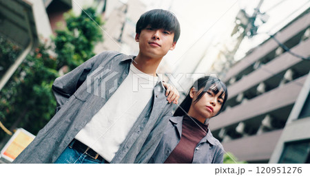 Couple, portrait and fashion with attitude in street, confidence and travel together in city. Man, woman and clothes with partner, love or bonding for connection in low angle on urban road in Japan Couple, portrait and fashion with attitude in street, confidence and travel together in city. Man, woman and clothes with partner, love or bonding for connection in low angle on urban road in Japan 120951276