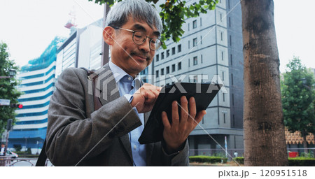 Businessman, tablet and research in city for planning, communication or networking client with idea. Japanese person, technology and mature architect for travel, development and proposal with project Businessman, tablet and research in city for planning, communication or networking client with idea. Japanese person, technology and mature architect for travel, development and proposal with project 120951518