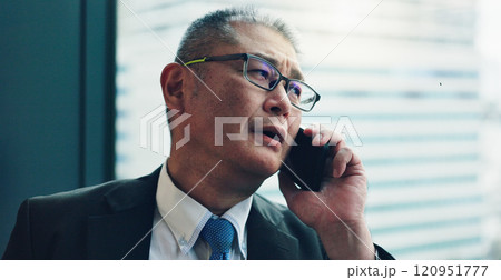 Phone call, office and mature Asian man by window for contact, communication and online chat. Corporate, business manager and person on smartphone for talking, networking and discussion in Japan 120951777
