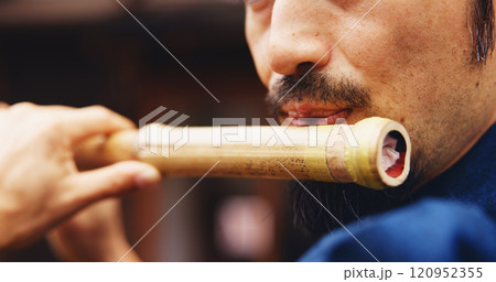 Japanese man, mouth and music for flute practice, performance and zen sound for Shinto meditation. Sensei person, bamboo and fue instrument for tradition, culture and spiritual heritage with shinobue 120952355