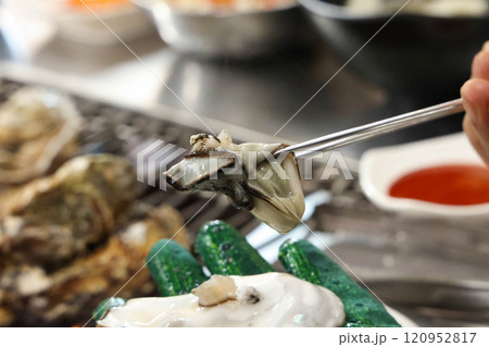 Korean seafood food. Grilled oysters Korean seafood food. Grilled oysters 120952817