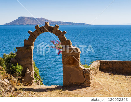 Landscape on island Taquile with stone arch, Puno region, Peru Landscape on island Taquile with stone arch, Puno region, Peru 120952848
