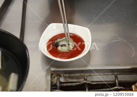 Korean seafood. bbq Oysters with red chili pepper paste with vinegar 120953088