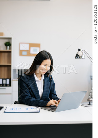 Business woman using tablet and laptop for doing math finance on an office desk, tax, report, accounting, statistics, Business woman using tablet and laptop for doing math finance on an office desk, tax, report, accounting, statistics, 120953128