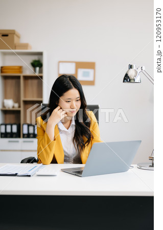 Business woman using tablet and laptop for doing math finance on an office desk, tax, report, accounting, statistics, Business woman using tablet and laptop for doing math finance on an office desk, tax, report, accounting, statistics, 120953170