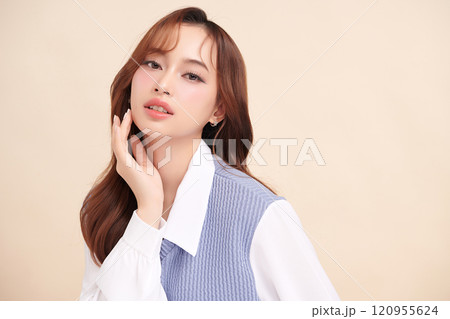 Beautiful young asian woman with clean fresh skin on beige background, Face care, Facial treatment, Cosmetology, beauty and spa, Asian women portrait. 120955624