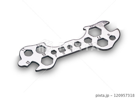High angle view of single metallic multifunctional spanner. 120957318