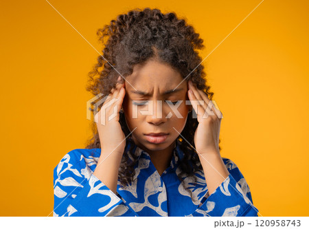 Pretty woman is suffered headache. Migraine, holds temples, magnetic storms Pretty woman is suffered headache. Migraine, holds temples, magnetic storms 120958743