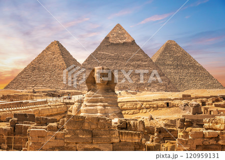 The Great Sphinx next to the Pyramids of Egypt in the sands of Giza desert 120959131