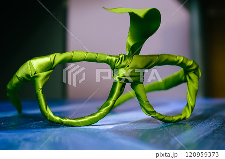 unusual green eyeglass frames made of fabric. High quality photo unusual green eyeglass frames made of fabric. High quality photo 120959373