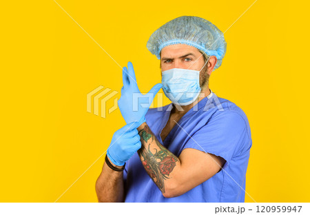 Man In Hospital. medical test for vaccine. new virus immunity. coronavirus in China. epidemic is rapid spread of infection disease. healthcare. man doctor wear rubber gloves. nurse in respirator mask 120959947