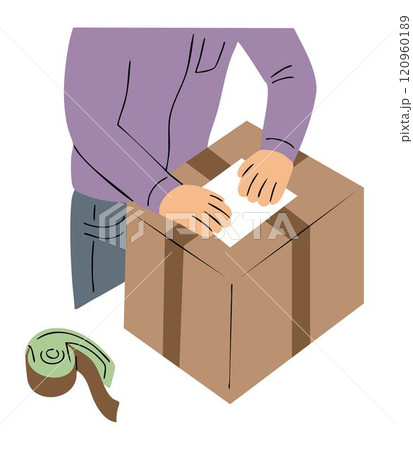A man sticks a delivery note on a box A man sticks a delivery note on a box 120960189