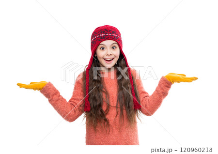 Teen girl in hat enjoying childhood. Girl wearing trendy outfit with knitted beanie hat. Girl with winter hat isolated on white. Winter fashion style trend. Winter offer 120960218