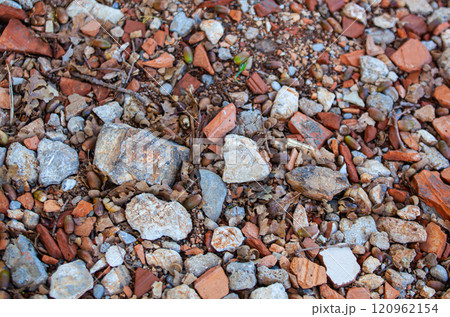 Stones of different colors. Coarse texture. Material for construction. Cobbles of different sizes. Stones of different colors. Coarse texture. Material for construction. Cobbles of different sizes. 120962154