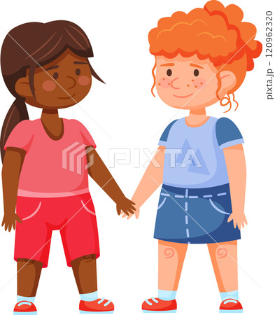 Two young girls, one african american and one caucasian with red hair and freckles, stand side by side holding hands, smiling and demonstrating interracial friendship and unity 120962320