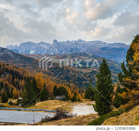 Overcast morning autumn alpine Dolomites mountain scene. Peaceful Valparola Path view, Belluno, Italy. Overcast morning autumn alpine Dolomites mountain scene. Peaceful Valparola Path view, Belluno, Italy. 120963886