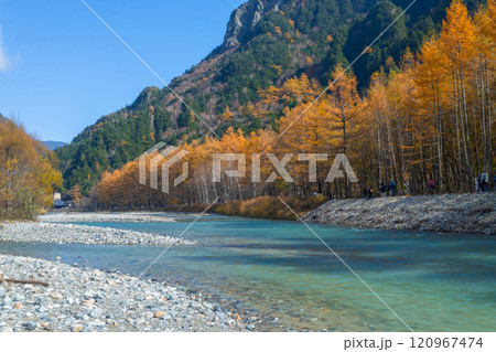 Kamikochi has a beautiful atmosphere during the autumn foliage season, part of the Japan Alps, Nagano,Japan Kamikochi has a beautiful atmosphere during the autumn foliage season, part of the Japan Alps, Nagano,Japan 120967474