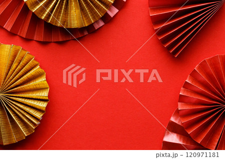 Lunar new year. paper fans on red background. 120971181