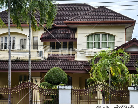 Detailed view of windows, doors and balconies of city buildings  120972239