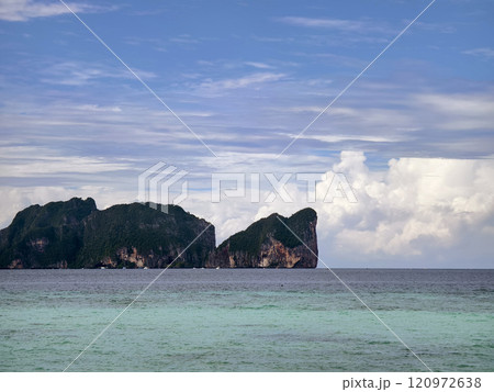 A serene and tranquil island landscape featuring crystal clear water A serene and tranquil island landscape featuring crystal clear water 120972638