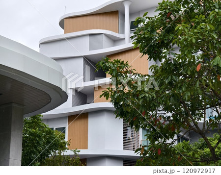 Detailed view of windows, doors and balconies of city buildings  120972917