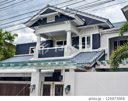 Detailed view of windows, doors and balconies of city buildings  120973068