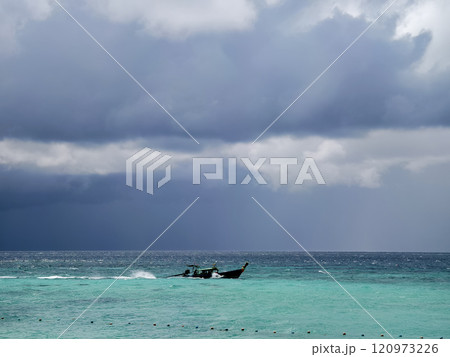 A serene and tranquil island landscape featuring crystal clear water 120973226