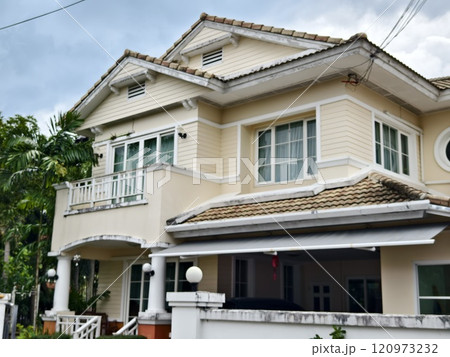 Detailed view of windows, doors and balconies of city buildings  120973232