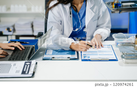 Medical technology network team meeting concept. Doctor hand working with smart phone modern digital tablet and laptop Medical technology network team meeting concept. Doctor hand working with smart phone modern digital tablet and laptop 120974261