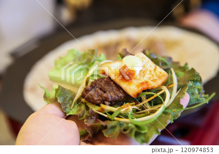 Korean barbecue food. Lettuce , Sesame leaf and meat wrap 120974853