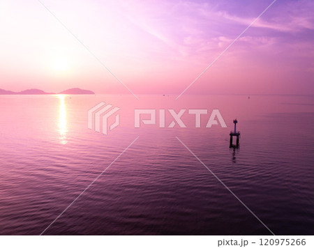 Aerial view sunset sky,Nature beautiful Light Sunset or sunrise over sea,Colorful scenery Sky with Amazing clouds and waves in sunset sky purple light cloud background 120975266