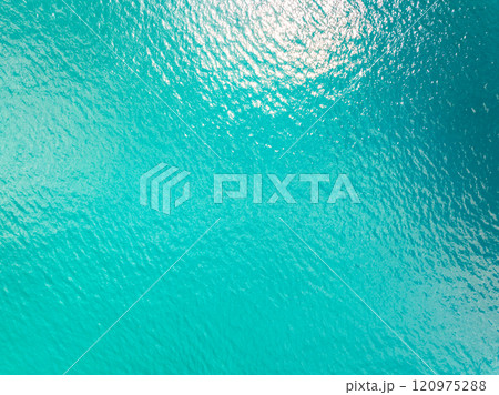 Sea surface aerial view,Bird eye view photo of small waves texture water surface turquoise sea background,Beautiful sea nature, Amazing view waves background 120975288