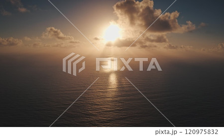 Breathtaking sunset over the pacific ocean, with golden light reflecting on tranquil waters and scattered orange clouds adding drama to the sky. Natural background. Aerial drone flight panorama Breathtaking sunset over the pacific ocean, with golden light reflecting on tranquil waters and scattered orange clouds adding drama to the sky. Natural background. Aerial drone flight panorama 120975832
