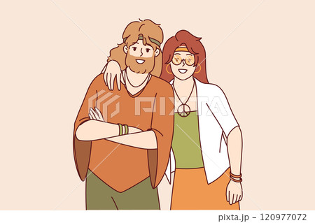 Hippie man and woman stand in embrace and smile, rejoicing at presence of free youth subculture 120977072