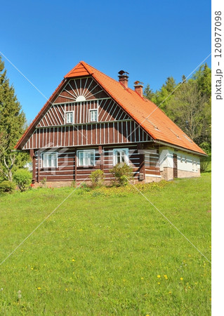 Old wooden cottage in Czech republic 120977098