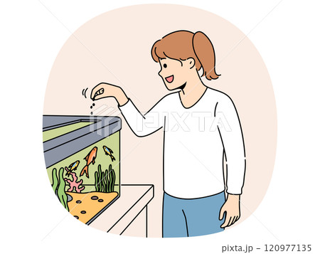 Little girl feeds fish in aquarium and watches underwater pets swimming with pleasure Little girl feeds fish in aquarium and watches underwater pets swimming with pleasure 120977135