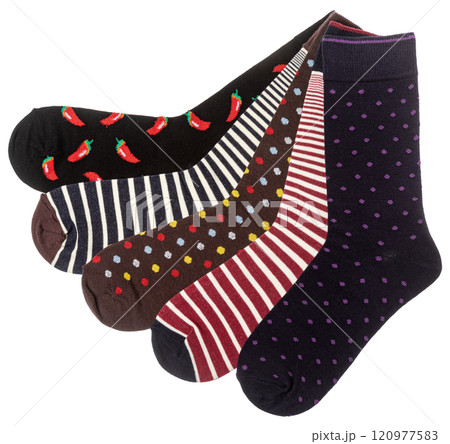 Set of colorful patterned socks with stripes, dots, and chili designs on a white background 120977583