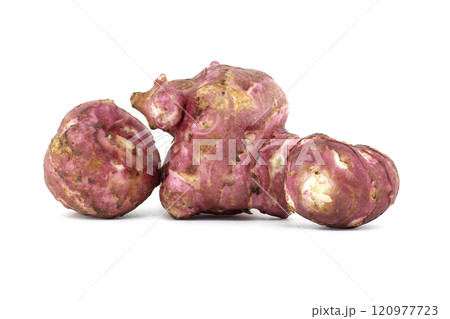 Close-Up of Fresh Jerusalem Artichokes on White Background Close-Up of Fresh Jerusalem Artichokes on White Background 120977723