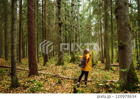 Young woman explores new, fantastic places around world, surrounded by nature relax Active Lifestyle 120978634