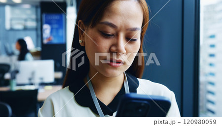 Japan, business and woman with cellphone, thinking and internet with stock market, connection or digital app. Asian person, accountant or employee with smartphone, communication or message to contact 120980059